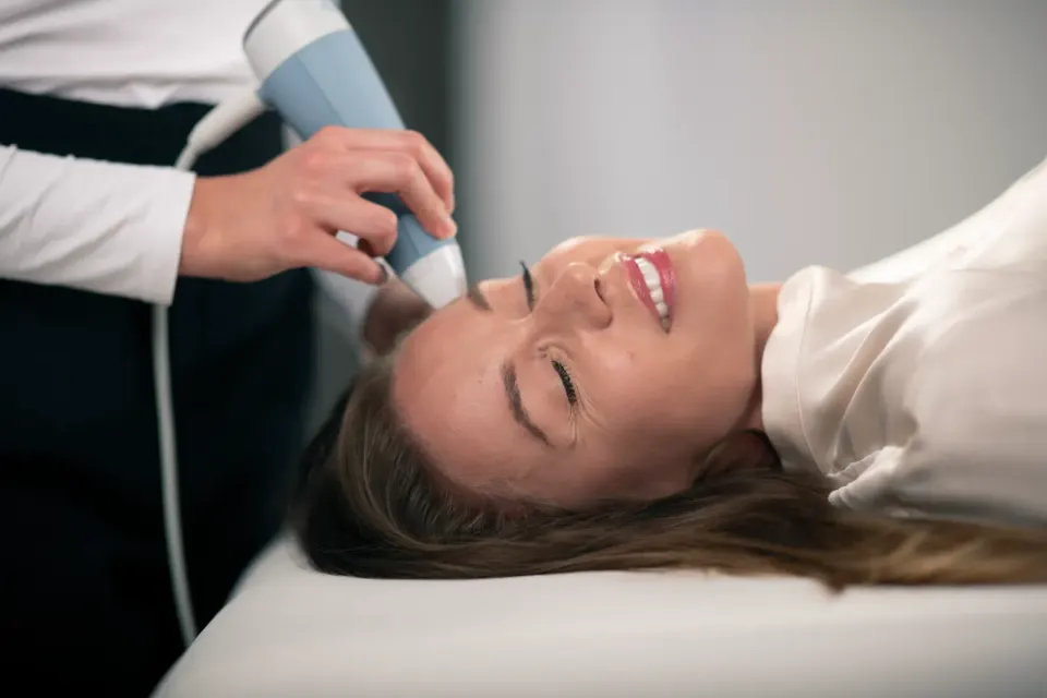 Patient receiving Exion RF skin rejuvenation treatment at Enclave Dental in Lake Mary FL