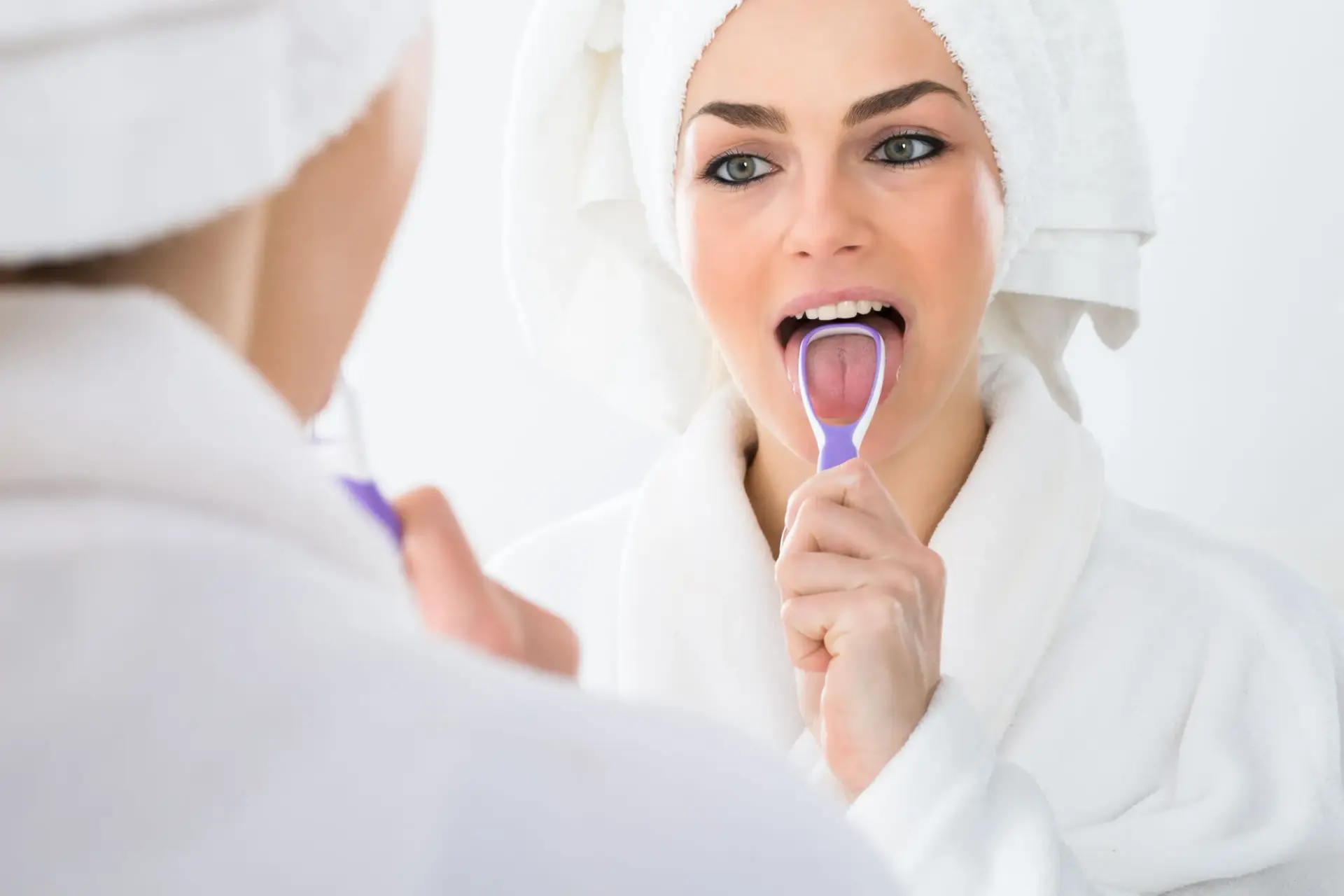 Patient smiling confidently after bad breath treatment at Enclave Dental in Lake Mary FL