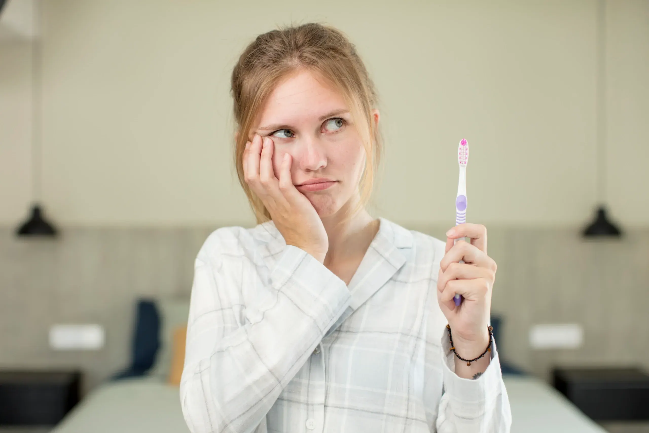 Dentist treating cavity with tooth-colored filling at Enclave Dental in Lake Mary FL
