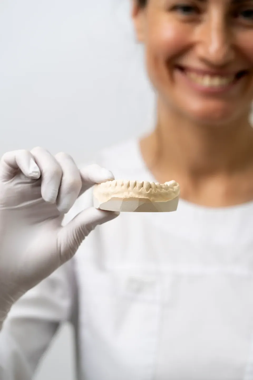 Clinical close-up illustrating safe night guard wear and proper dental appliance care