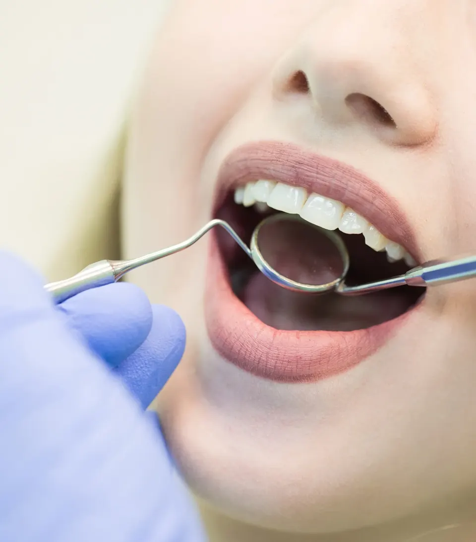 Patient and Dr. Shachi Shah reviewing veneer shade options at Enclave Dental Lake Mary