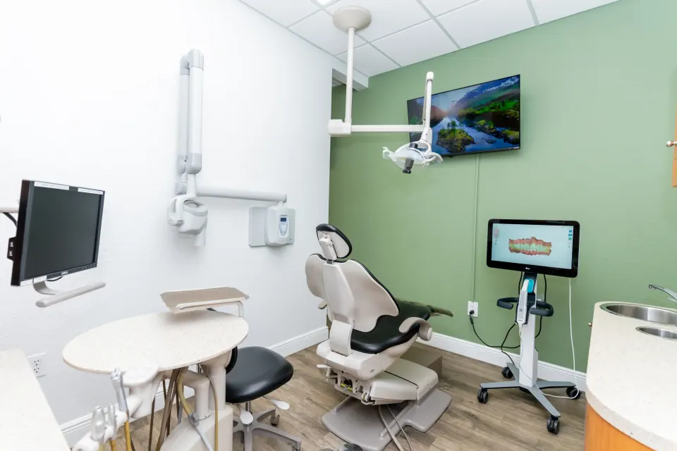 Enclave Dental front desk welcoming patients Lake Mary FL