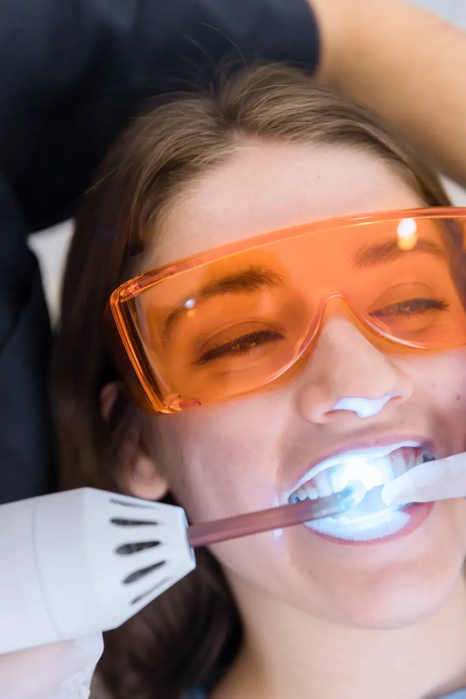 Confident patient portrait after teeth whitening consultation at Enclave Dental Lake Mary, FL