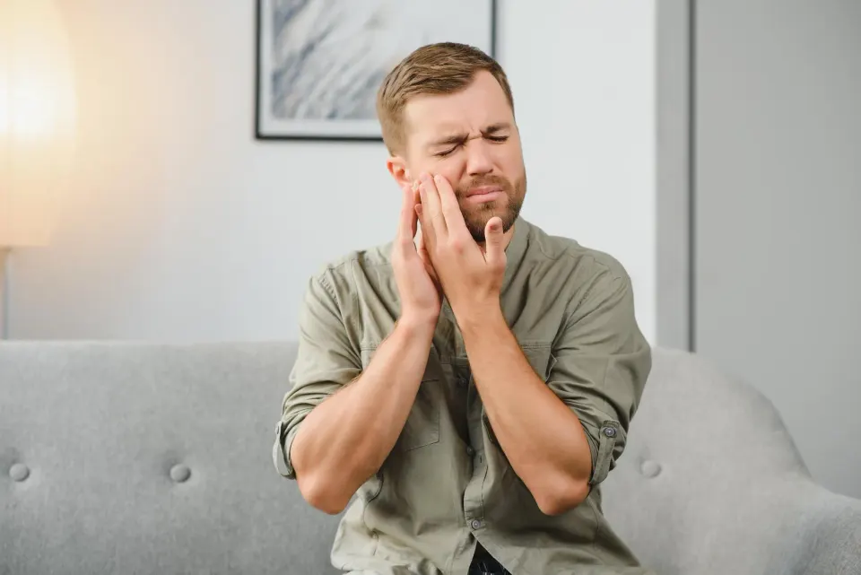 Close-up dental exam identifying the cause of a patient's toothache in Lake Mary FL